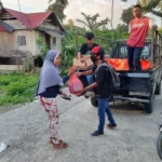 Laskar ASR Buton Bagikan Paket Sembako ke Anggotanya