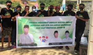 Milenial ASR Berbagi Masker dan Kampanyekan Vaksinasi