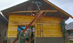 Cuaca Tak Menyurutkan Semangat Satgas TMMD Untuk Bekerja